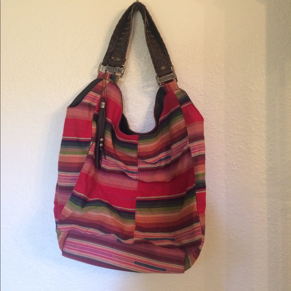 Roxy multi colored bag ( new) never used