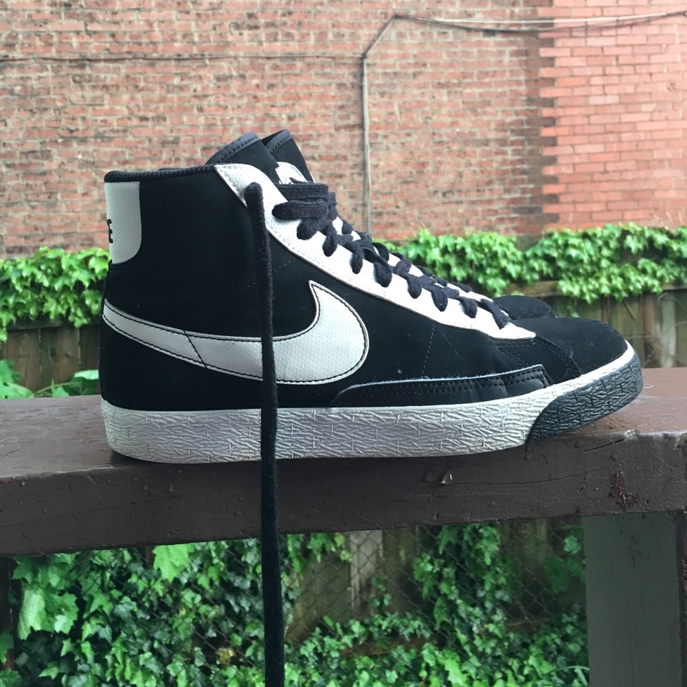 Black and white NIKE blazers