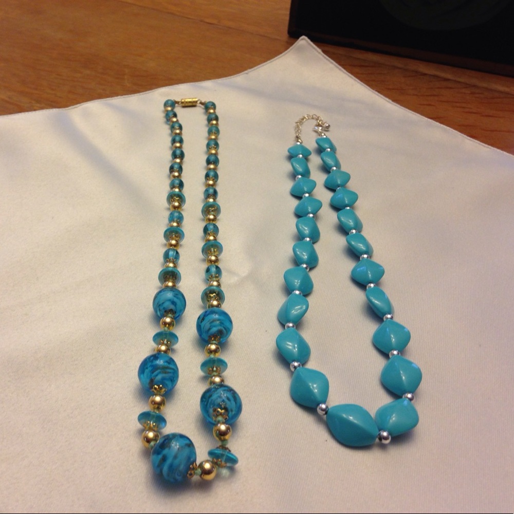 2 Aqua blue necklaces.