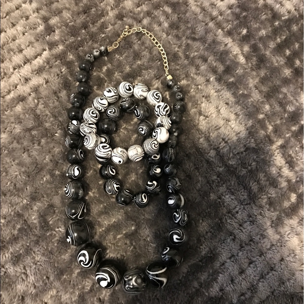 Black and white swirl necklace and bracelets