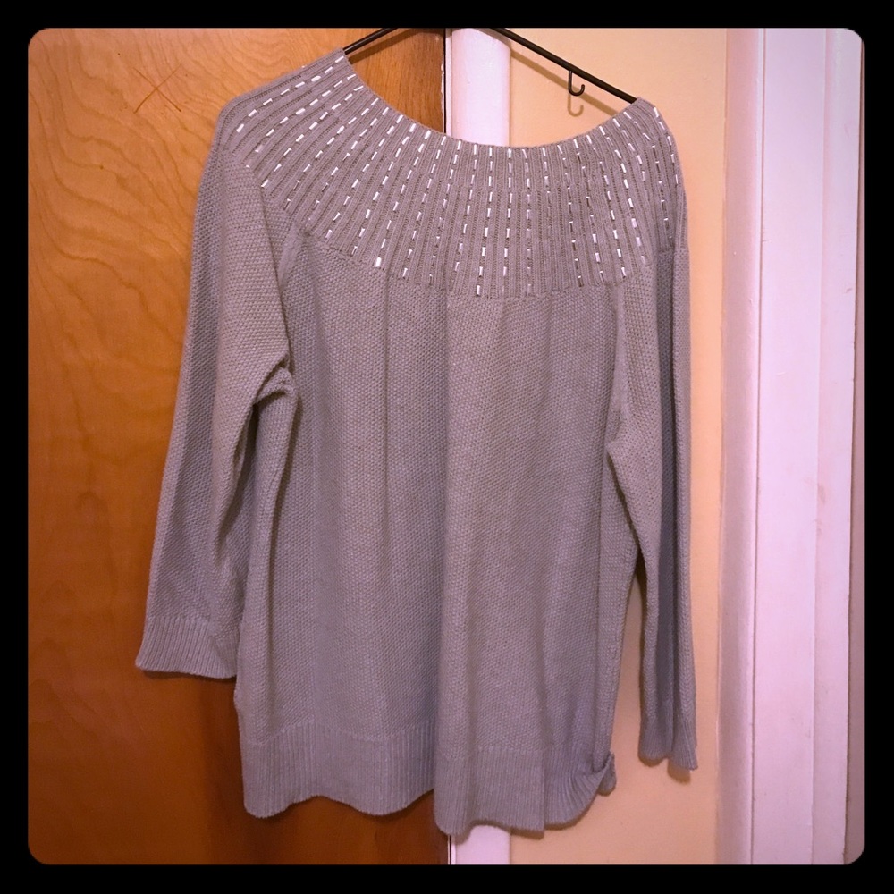 Gray sweater. With silver detailing