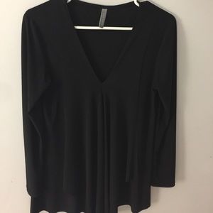 Never worn boutique top purchased as a gift