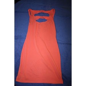 Salmon colored tight fighting cotton dress