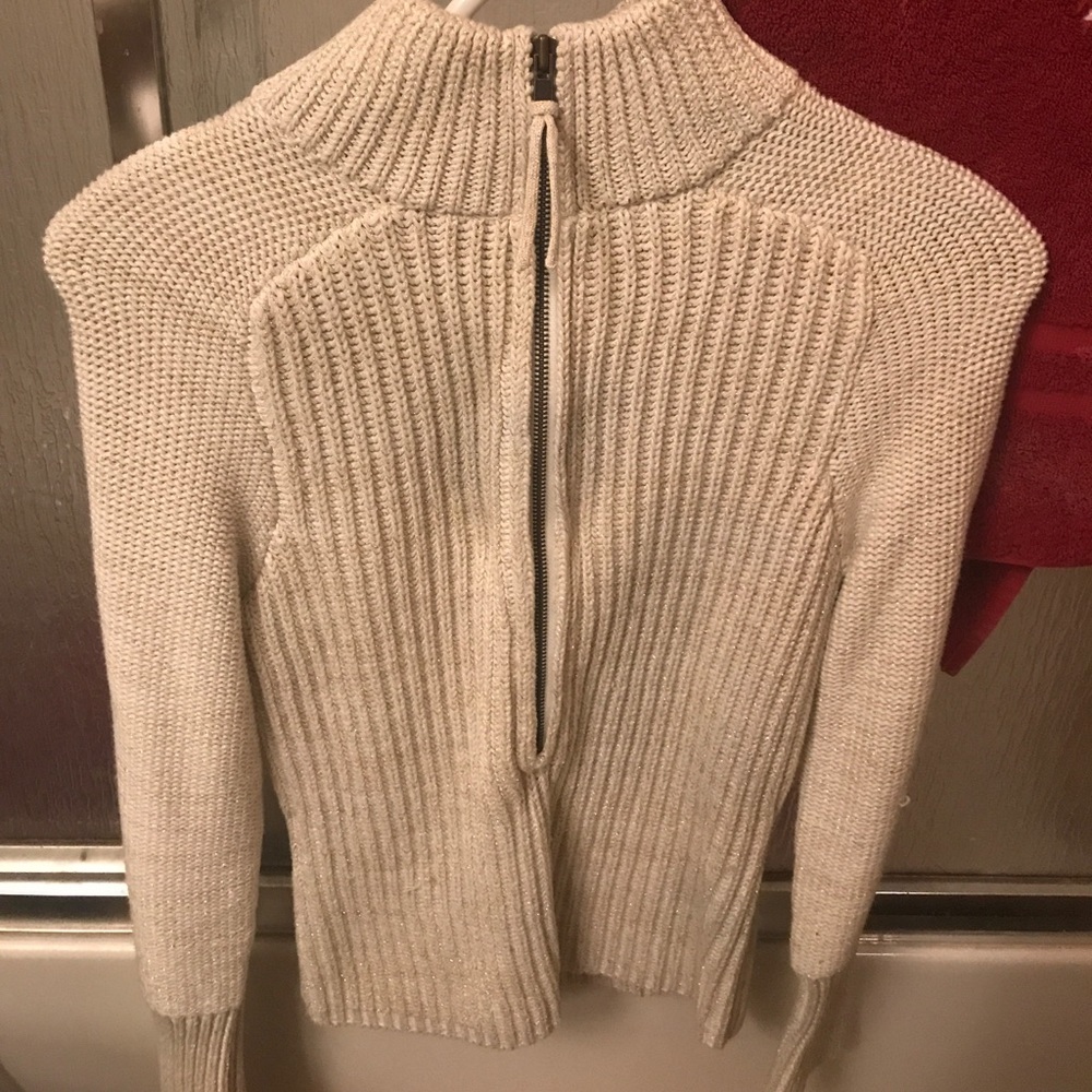 Adorable white long sleeve sweater