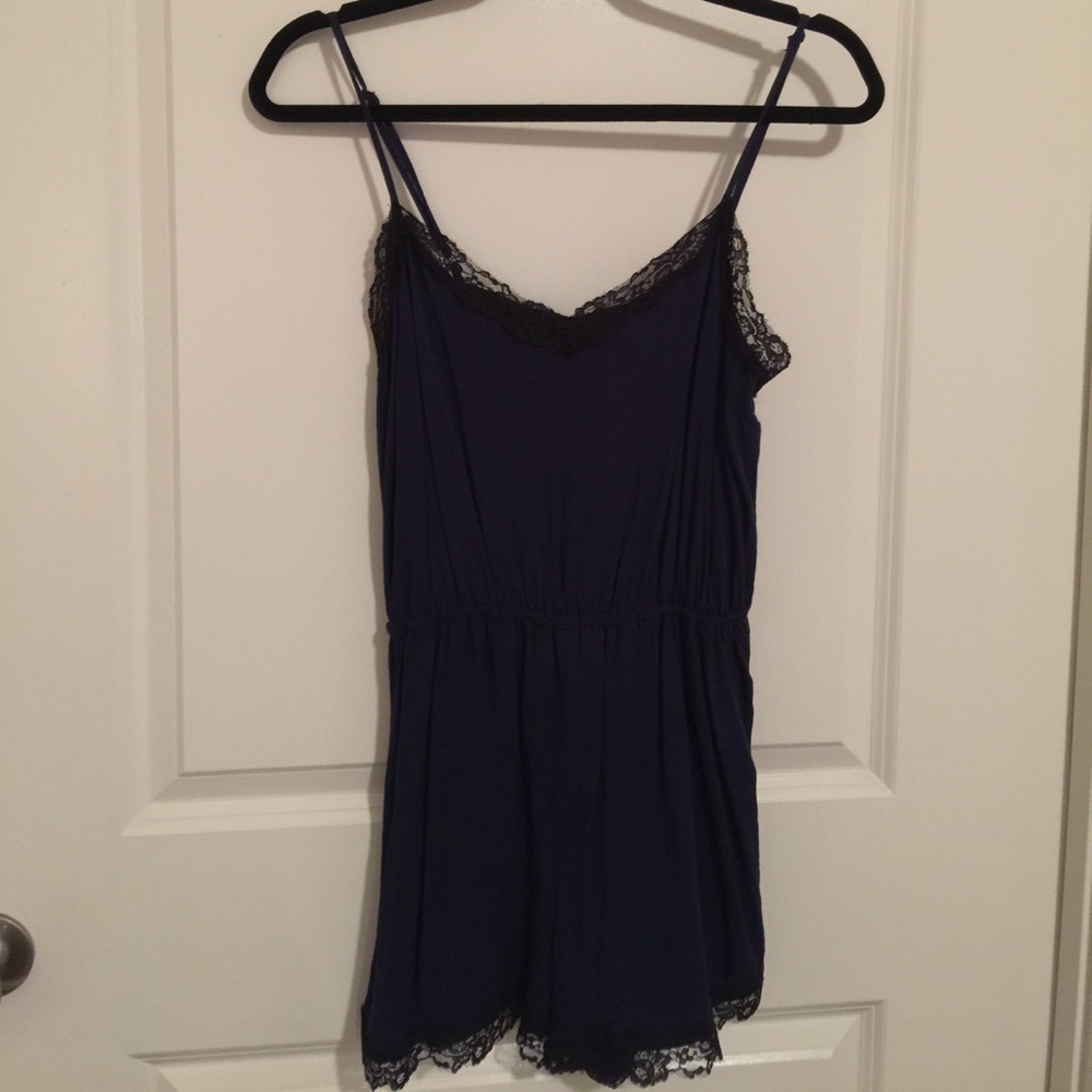 Navy blue romper with lace detail