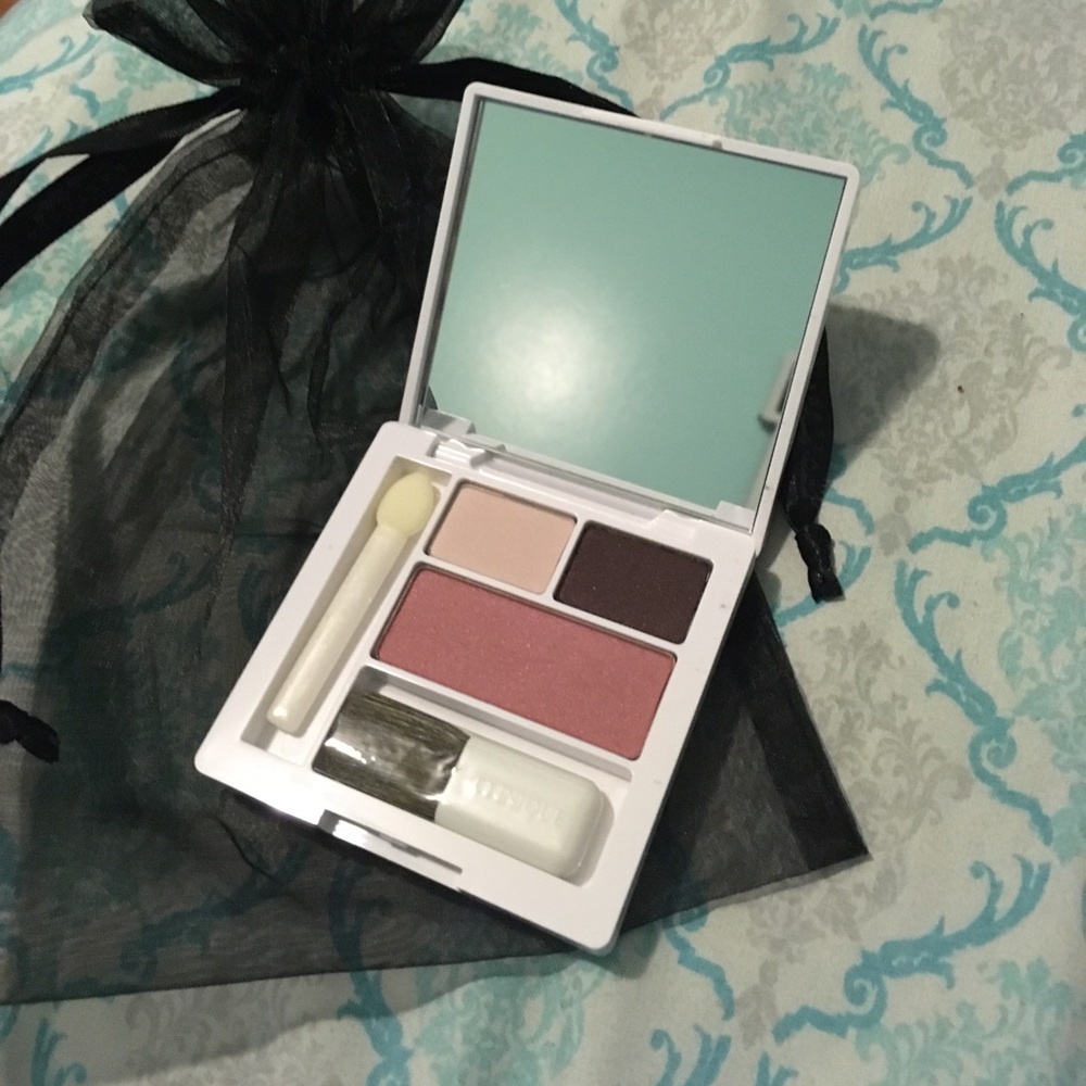 Clinique set and black bag
