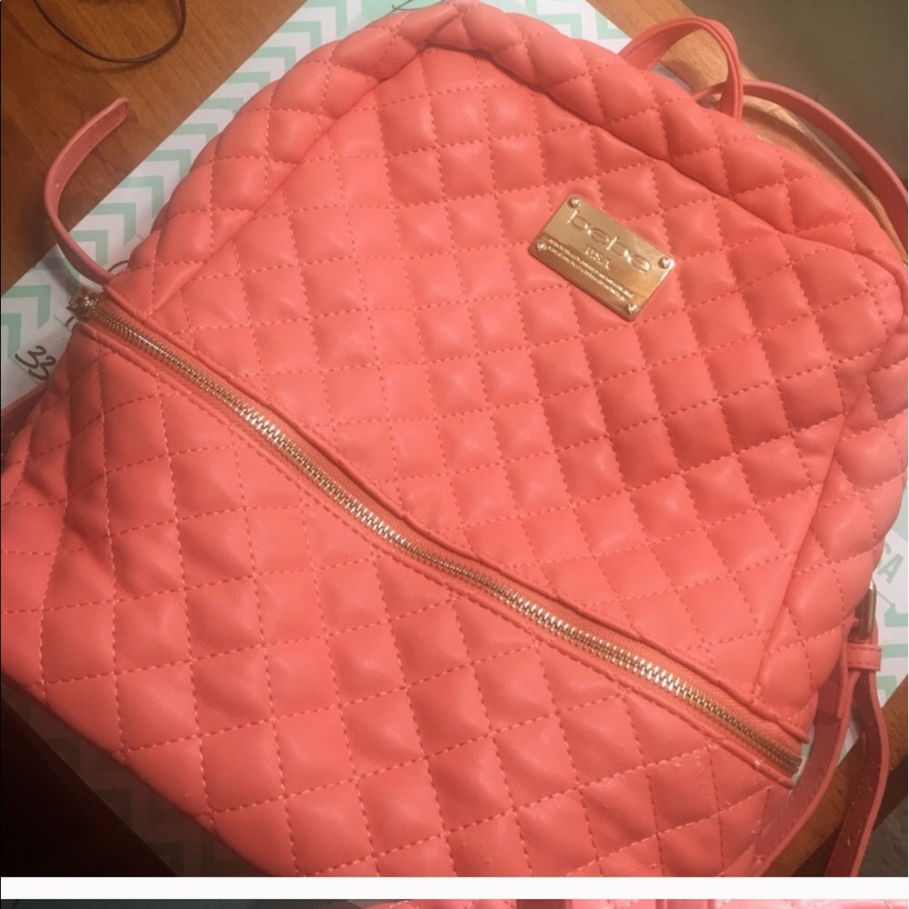 Bebe back pack peachy/ tangerine color