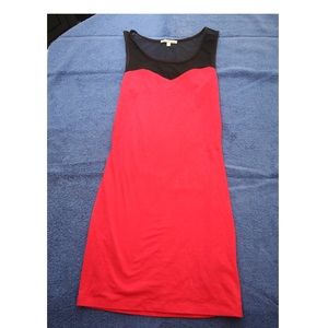 Tight fitting red party dress.