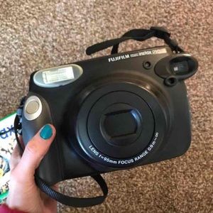 Wide size Polaroid camera practically new