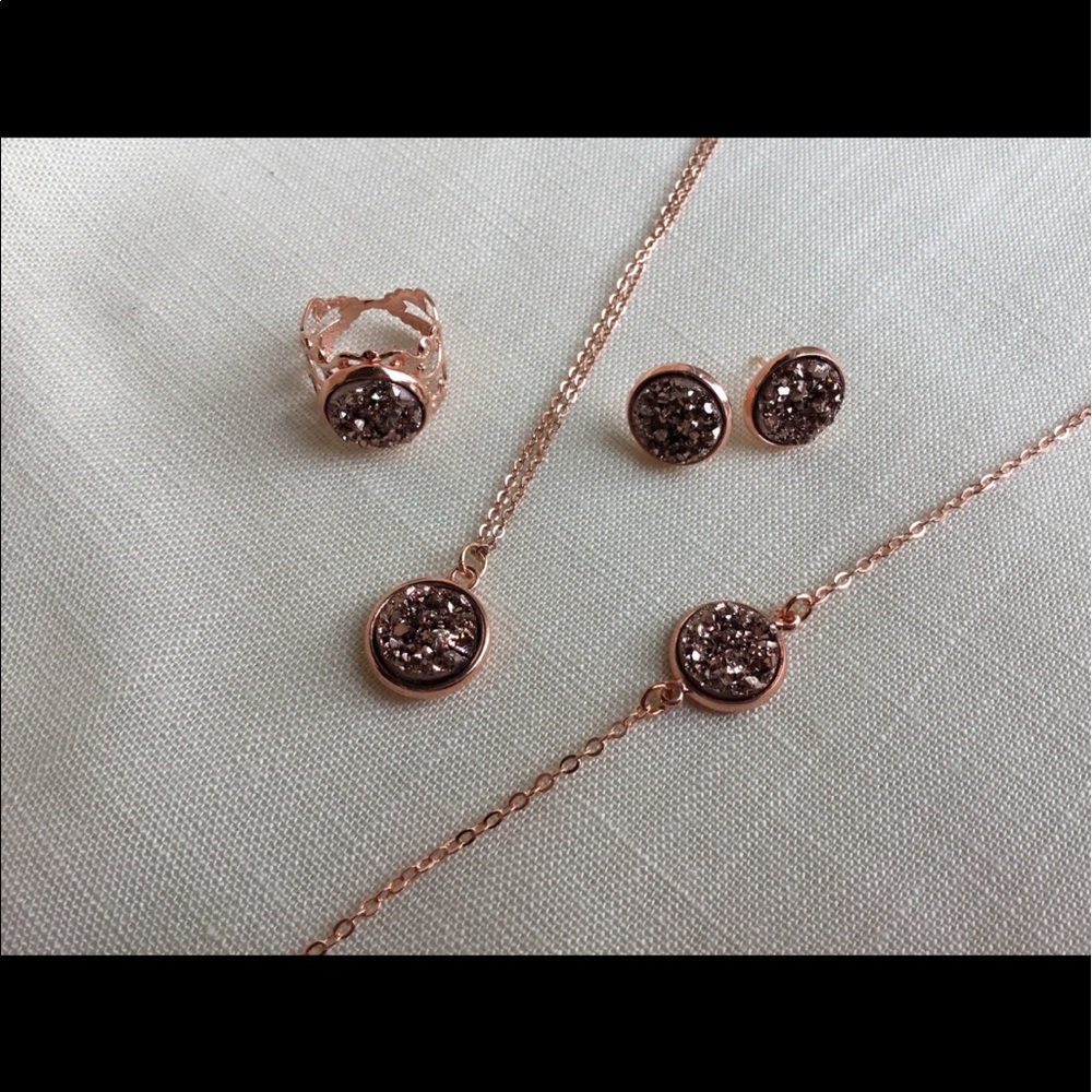 Necklace, bracelet,earrings,and ring set