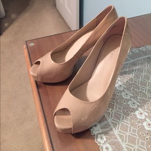 Nude patient leather heels.