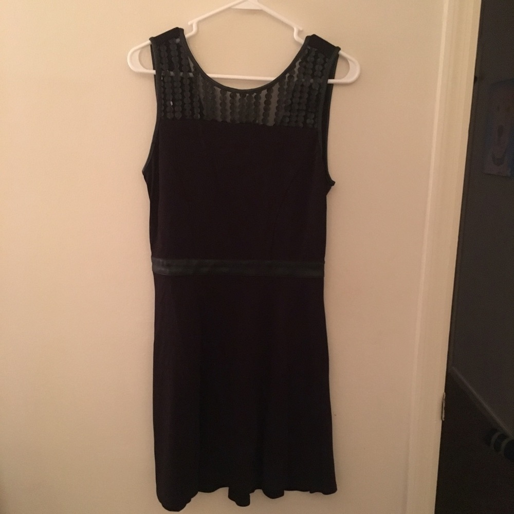 Black mini dress with shoulder detailing