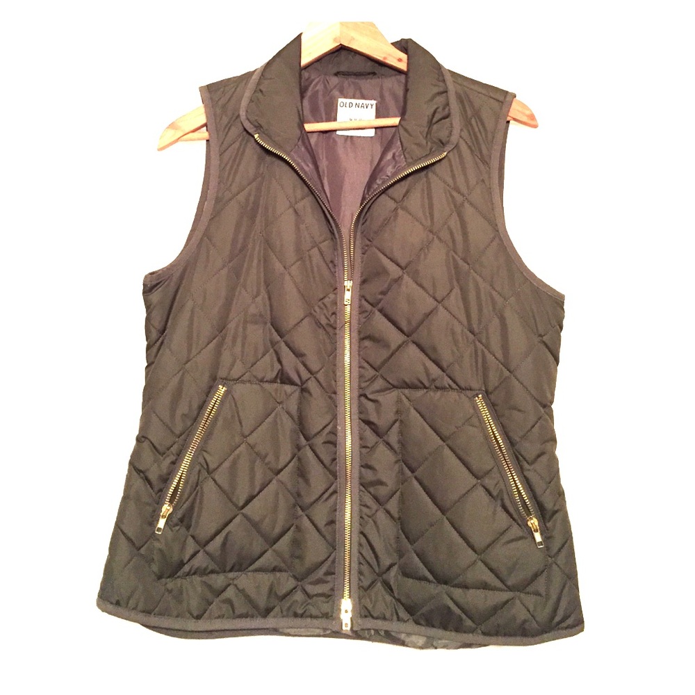 Hunter green quilted vest with gold zippers