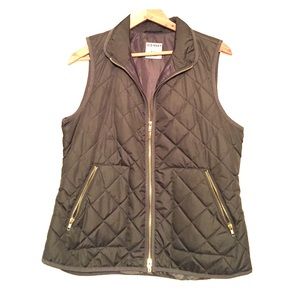 Hunter green quilted vest with gold zippers