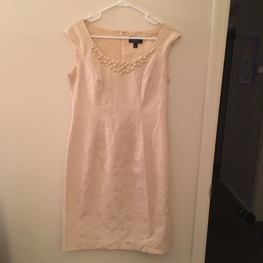 Cream midi dress with beaded neckline