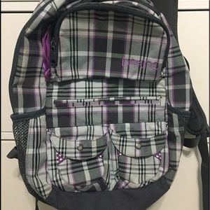 Dakine checkered print backpack