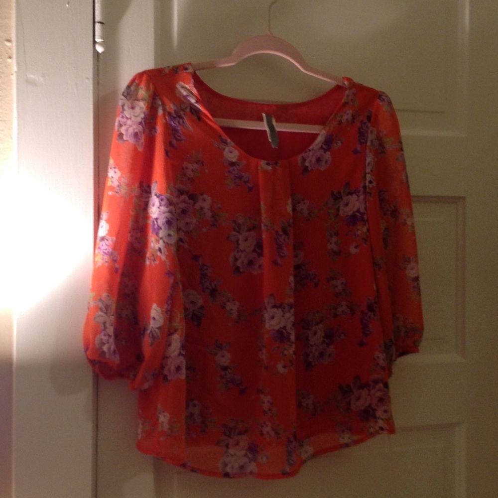 Orange floral blouse
