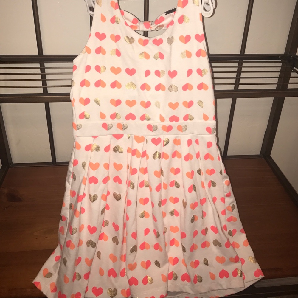 White dress with gold and coral hearts