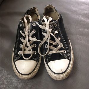 Well loved black low-top Converse!