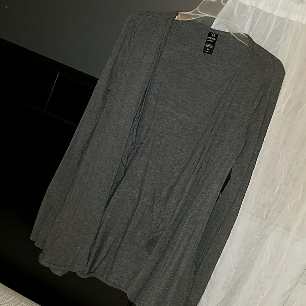 Worn once. Knit, feminine, athletic cover up.
