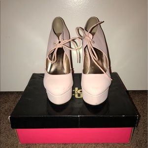 Pink suede tie heels