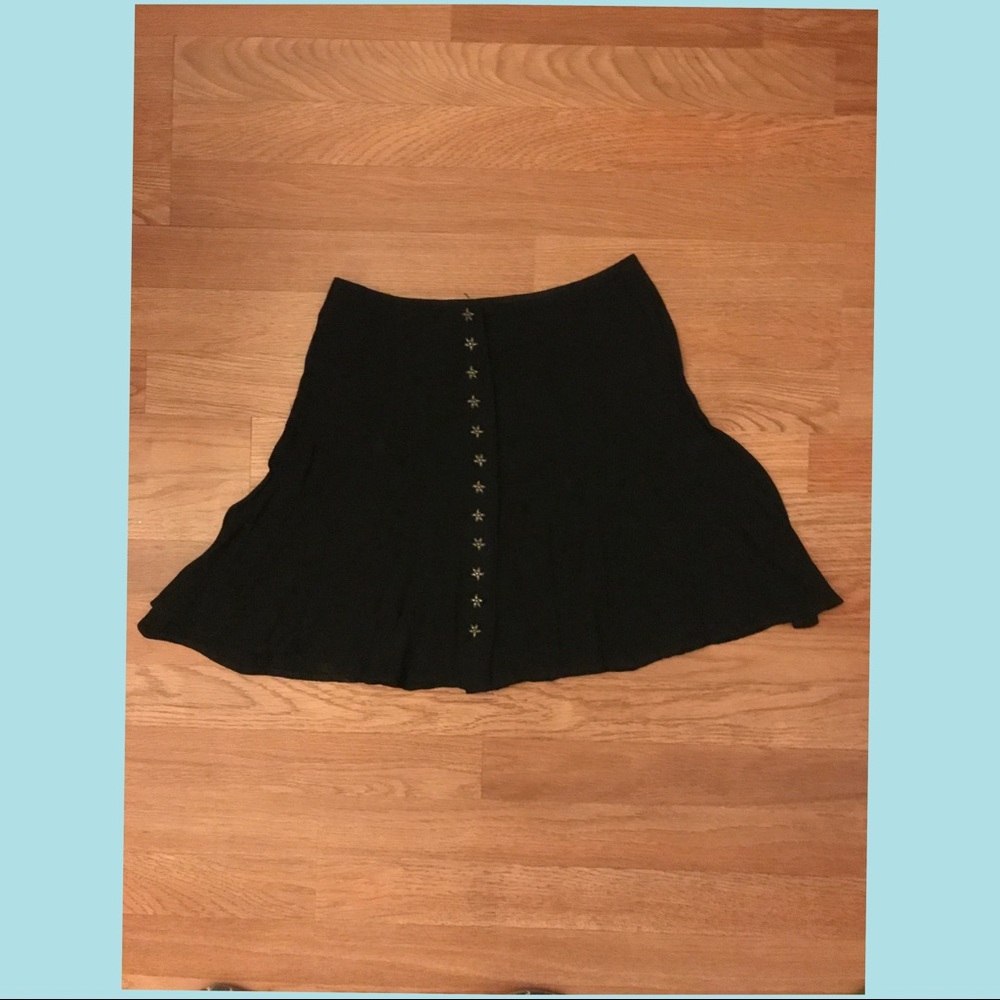 Cute black mini flare skirt with flower buttons 🌸