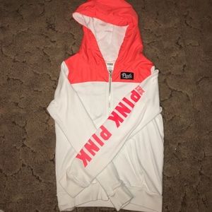 White and neon orange zip up jacket