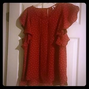 Gently worn red and white top