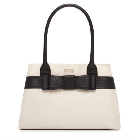 kate spade Handbags - Kate Spade Tan Purse with Black Bow