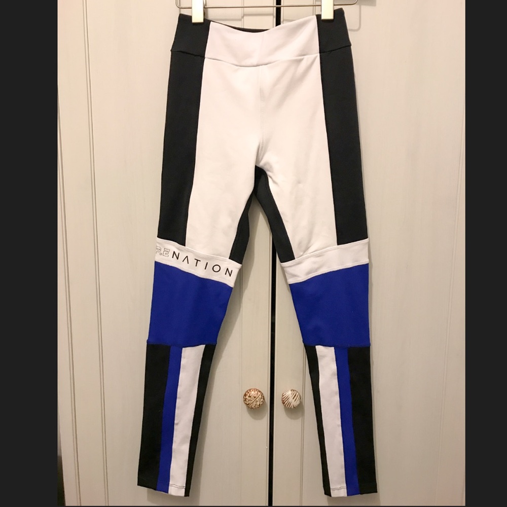 Unworn, new color blocked P.E. Nation leggings
