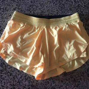 Yellow lululemon running shorts
