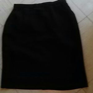 Black skirt in excellent condition. Pockets on bot