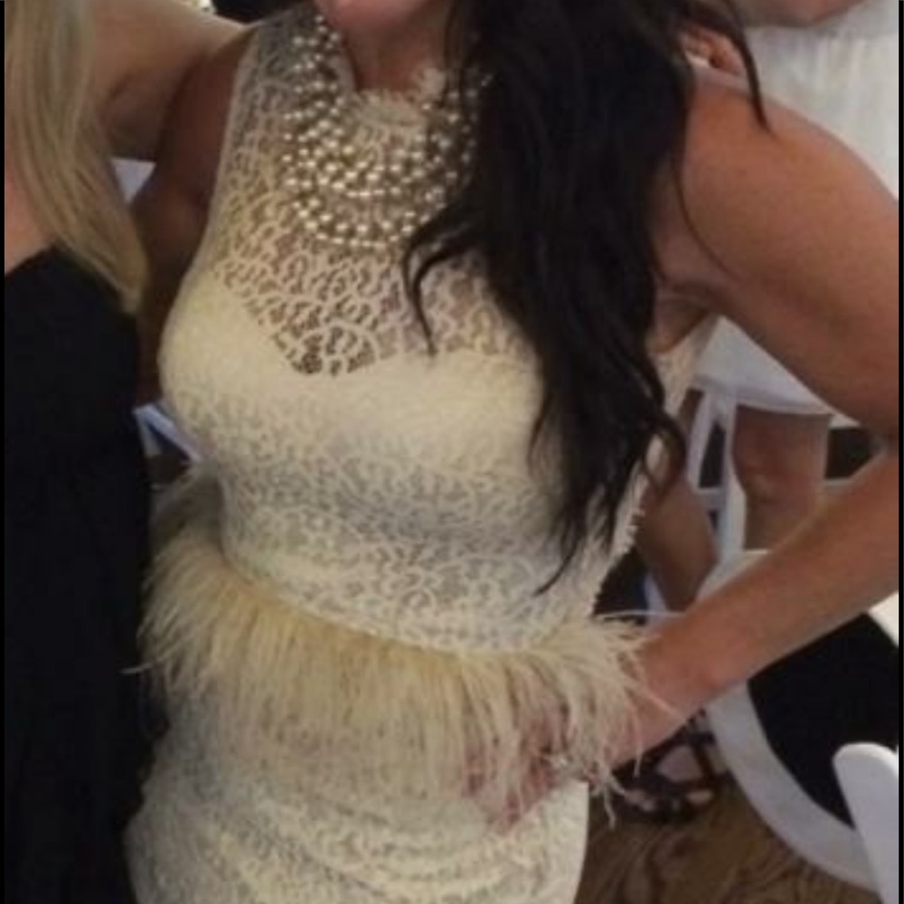 Bebe ladies lace cream mini dress.