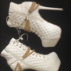 Textured white platform heels with chains attached