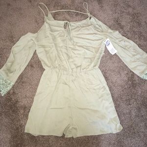Green Romper from The Buzz Boutique