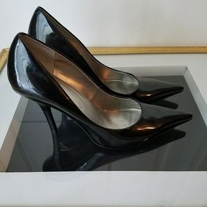 Guess Black patent pumps