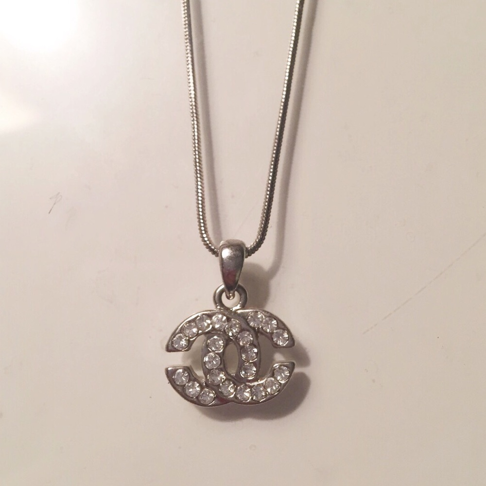 Sterling silver Chanel logo necklace