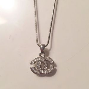 Sterling silver Chanel logo necklace
