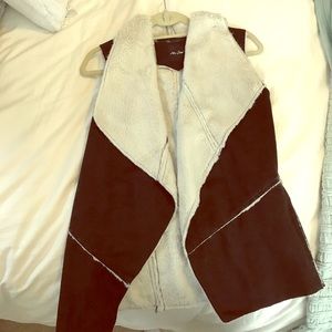 Black and white fur vest