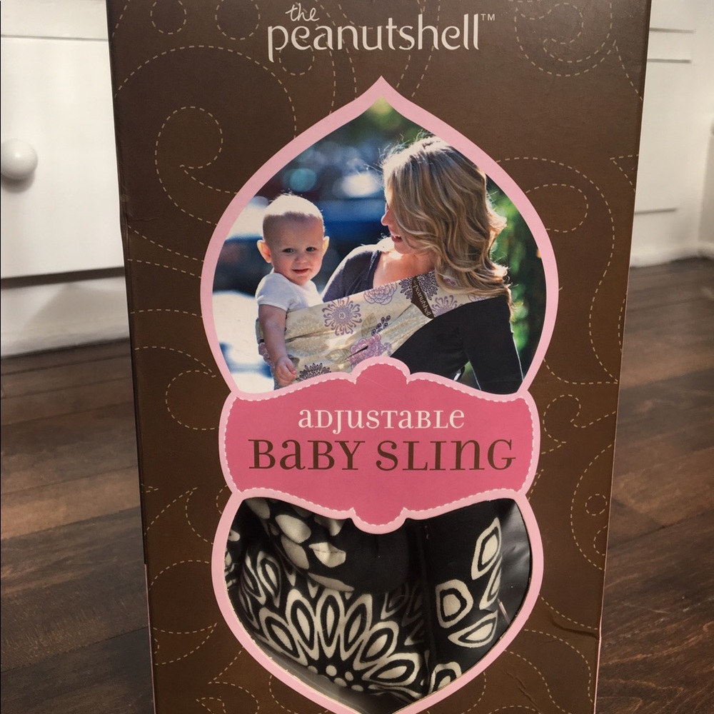 Peanut shell sling baby carrier