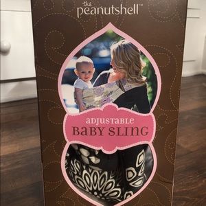 Peanut shell sling baby carrier
