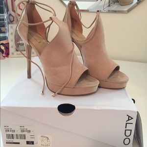 Nude suede pumps