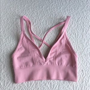 Never worn pink lululemon sports bra size 6
