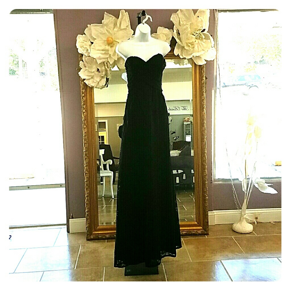 A beautiful black lace formal gown.