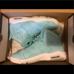 Baby blue / white Jordans.