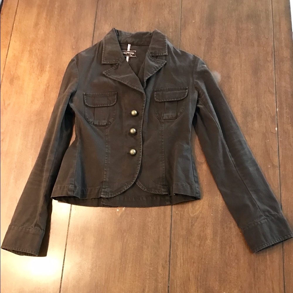 Brown military jacket with brass buttons