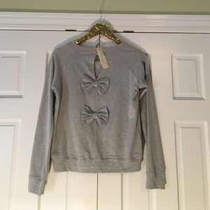 Grey sweatshirt size large NWT bow back detailing
