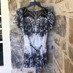 Gorgeous sheer top with built in tie belt