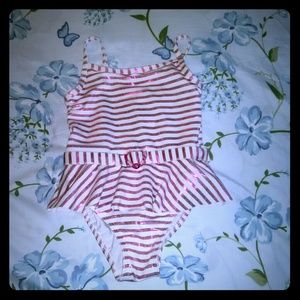 Penelope Mack Girl Swimsuit.