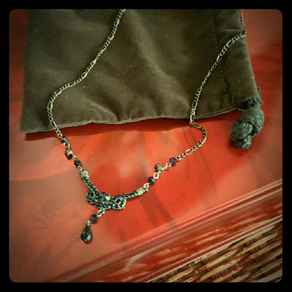 Silver necklace with black gems